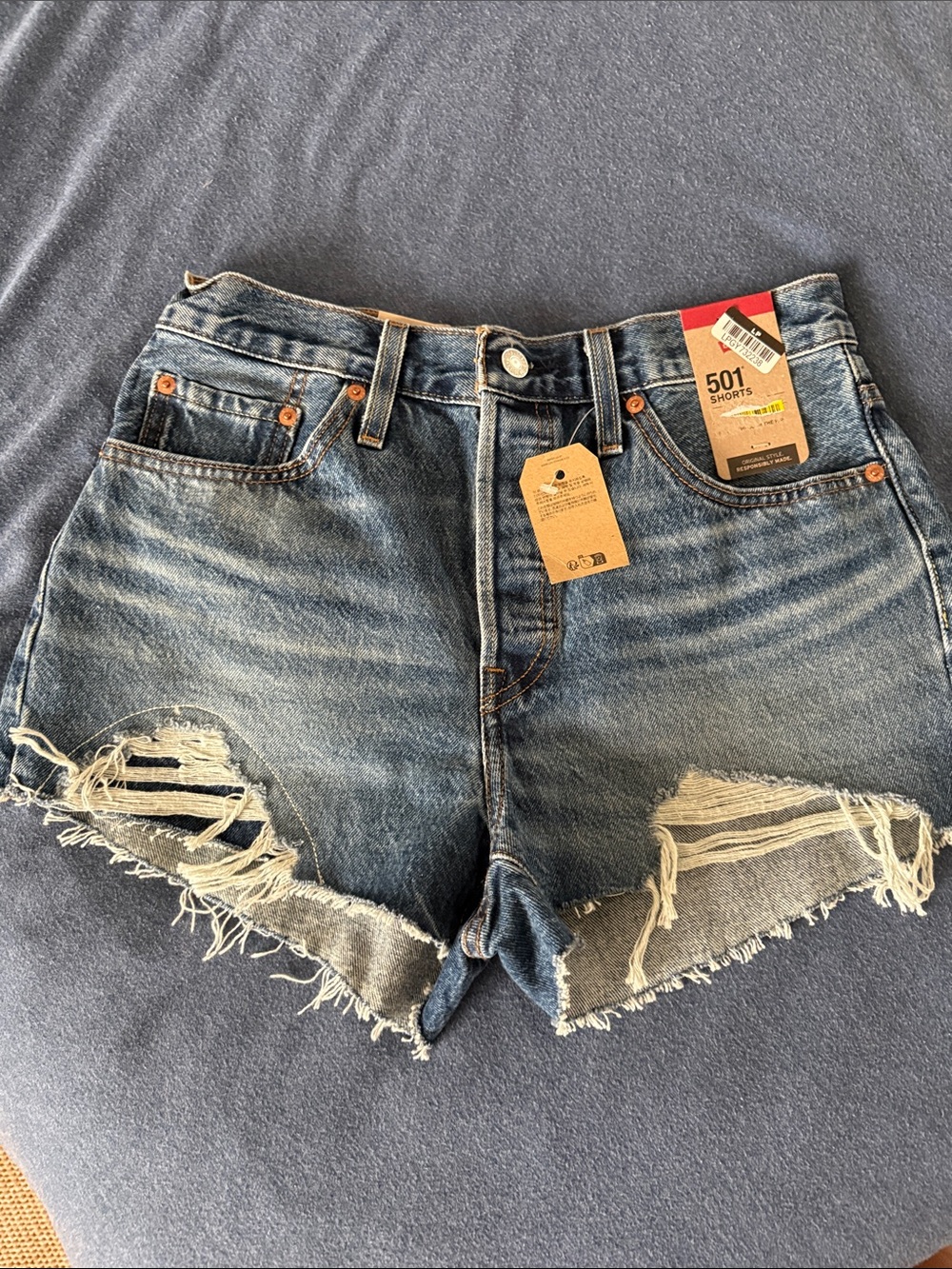 Levi's Distressed Mid-Blue 501 Cutoff Jean Shorts